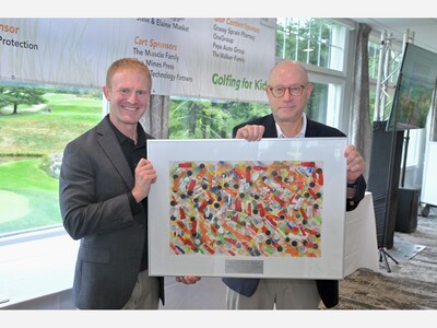 Golfers Show Up to Support Kids Despite the Weather 